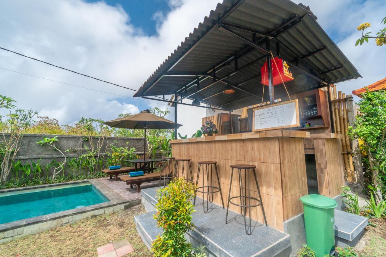 Wooden Puri Guesthouse อูลูวาตู ภายนอก รูปภาพ